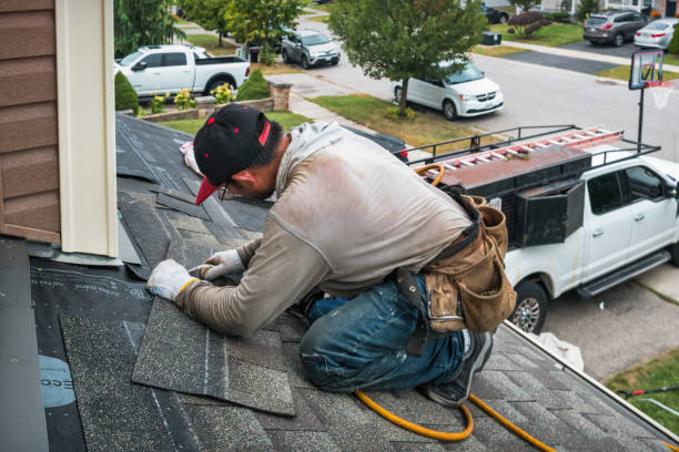 Professional Roof Replacement technician working in Marshall, NC